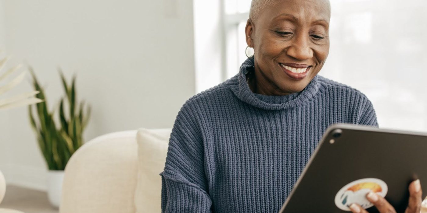 Senior lady looking at a tablet