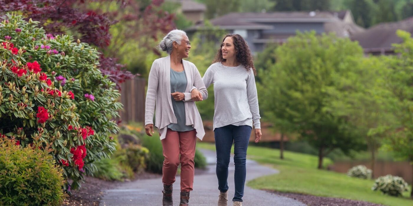 Two women talking a walk
