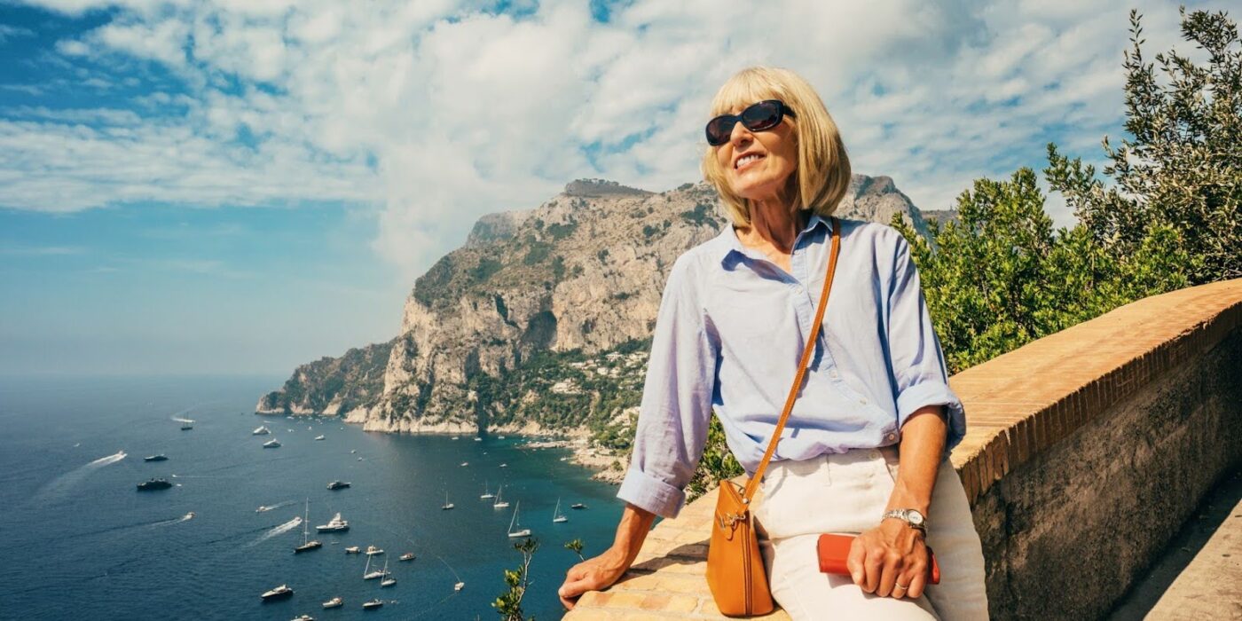 Senior woman overlooking an ocean