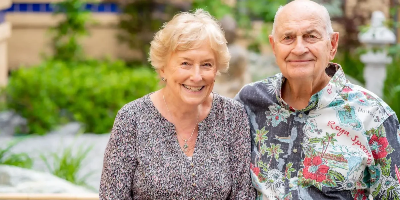 Senior couple sitting outdoors