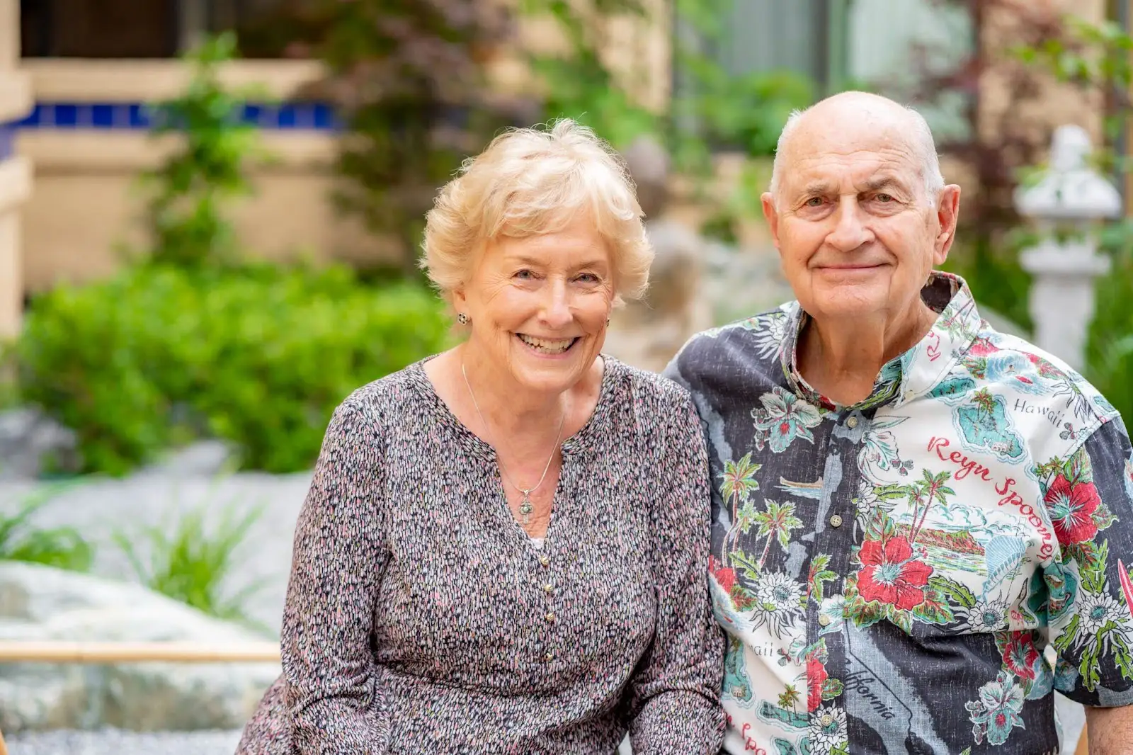 Senior couple sitting outdoors