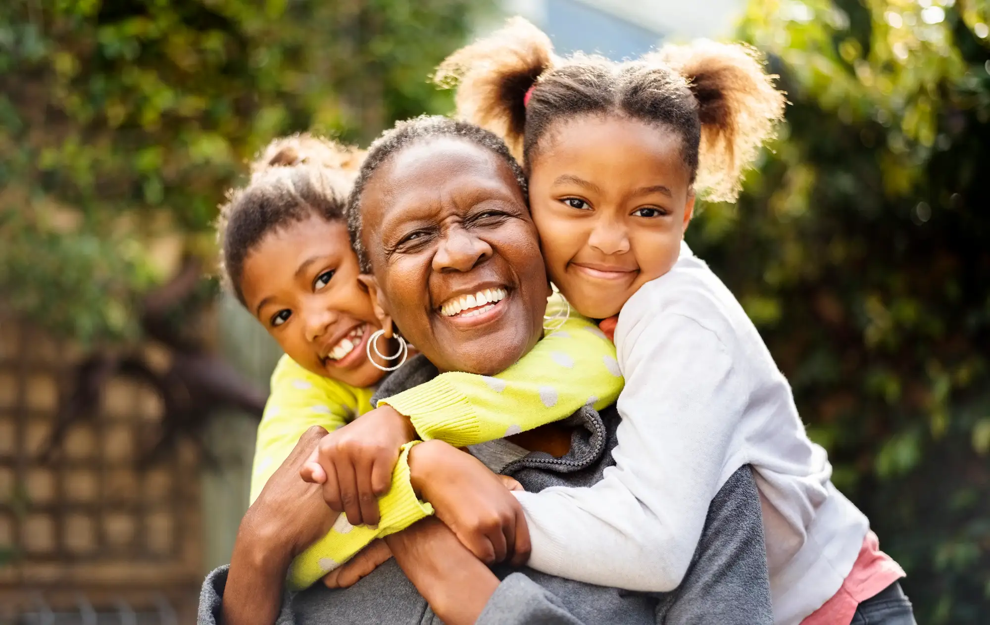 Senior grandmother with two granddaughters