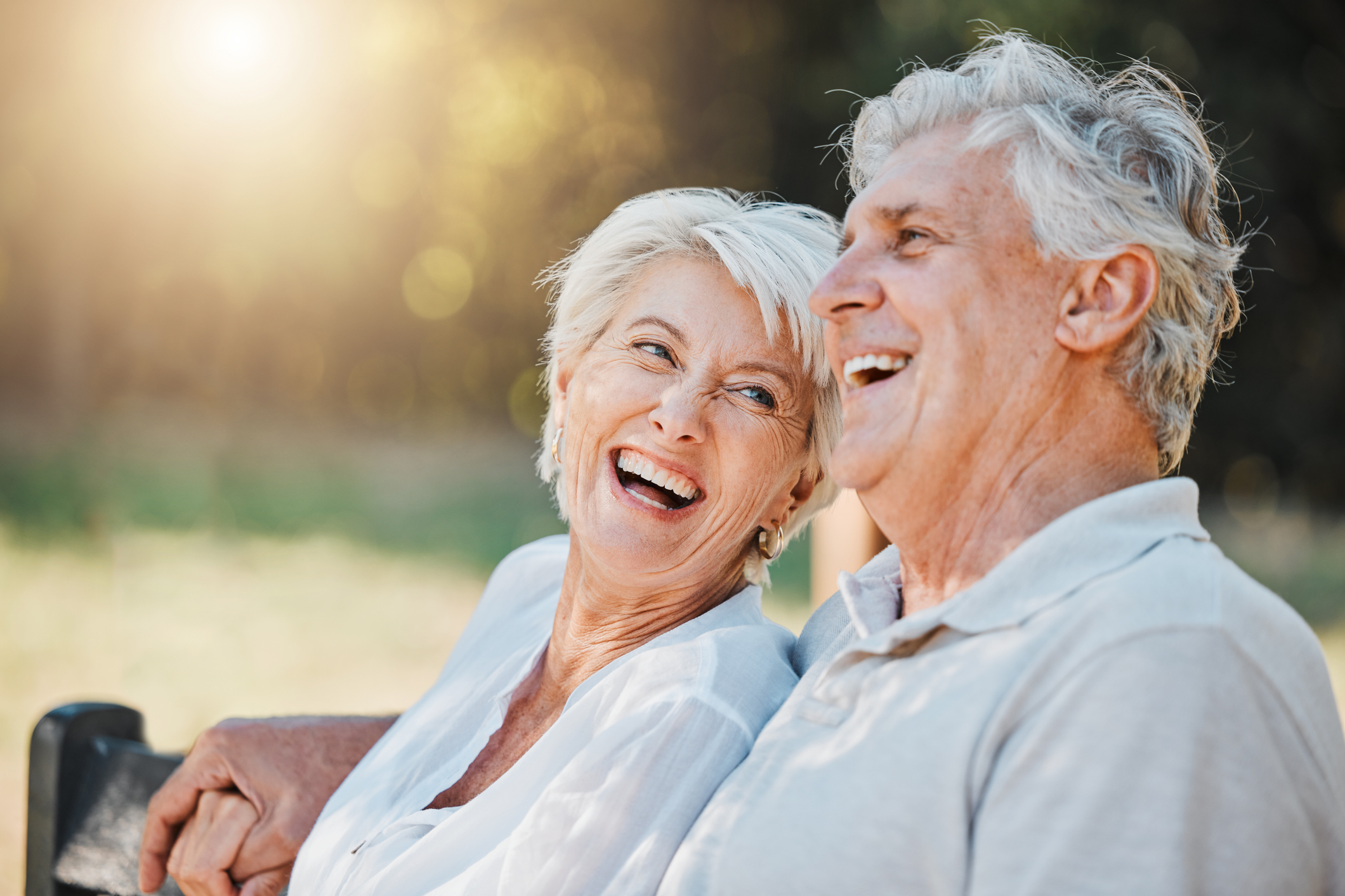 senior couple on park bench