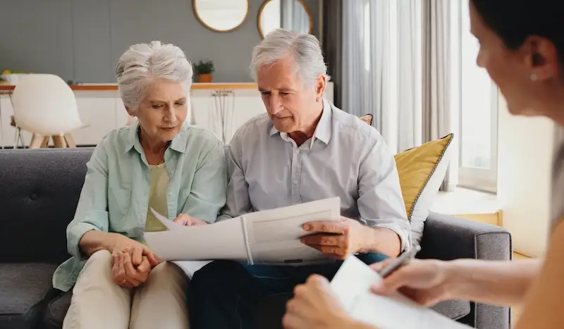 senior estate planning, inheritance and life insurance documents or contract with lawyer planning retirement. Pension fund, finance and financial investment with legal advisor for home mortgage.